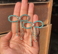 Just Go With The Bow Blue Earrings