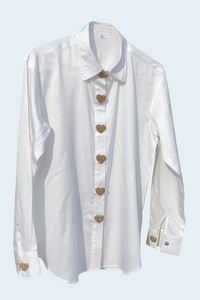 White shirt with gold buttons on a light blue background