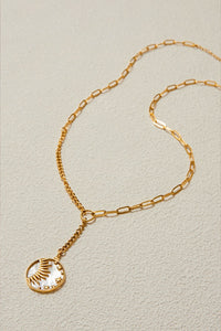 Shine Bright Pendant – Celestial Gold Disc Necklace with Sun & Star Motif